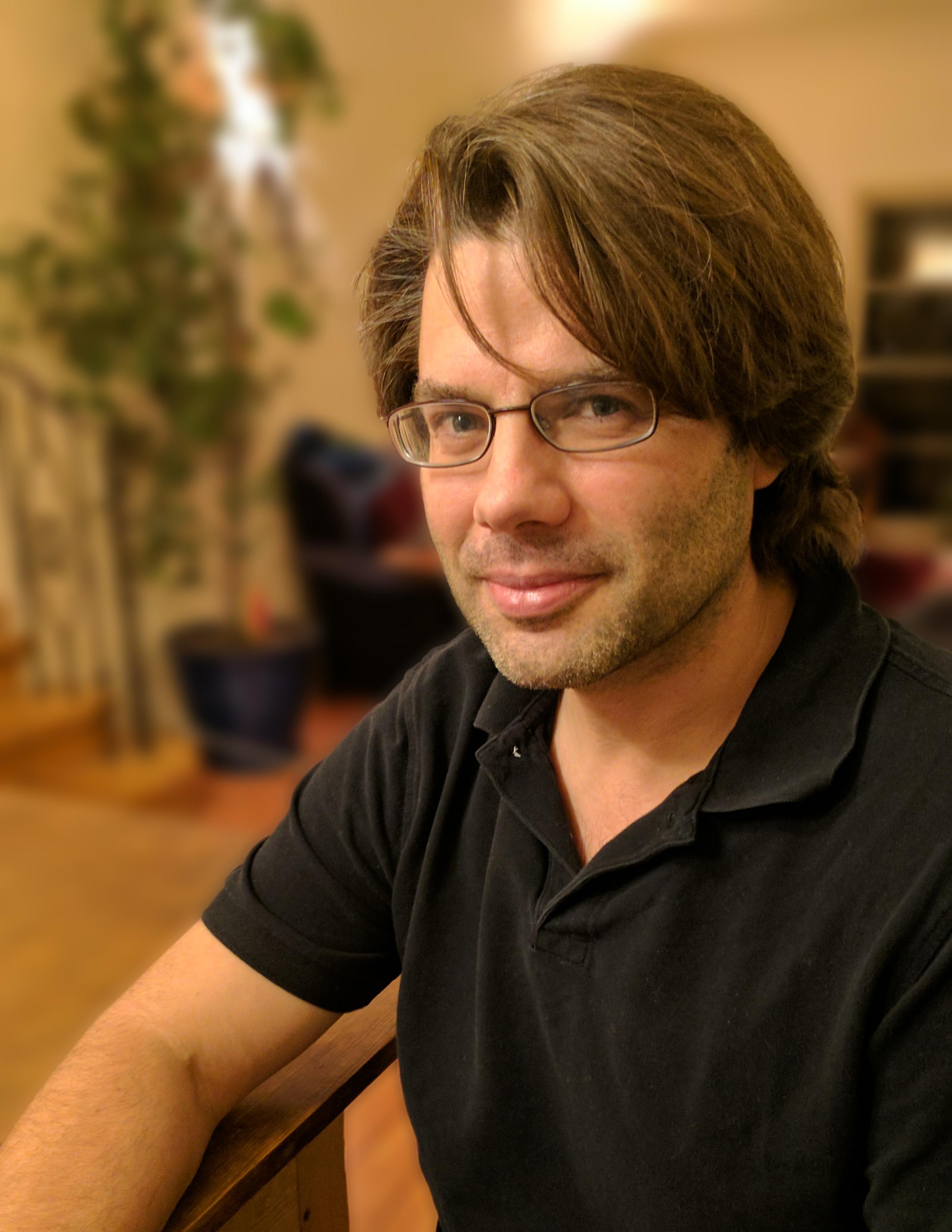 Eli Despres looks directly at the camera.