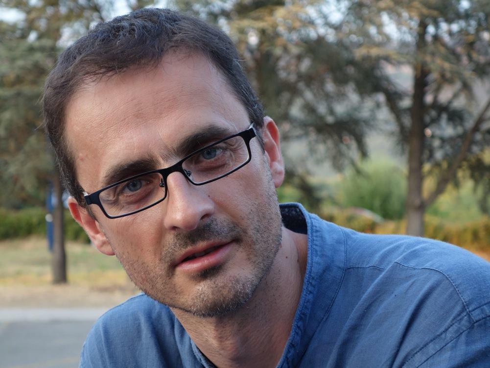 Petar Glomazić looks directly at the camera.