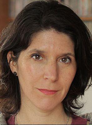 Macarena Aguiló looks directly at the camera.